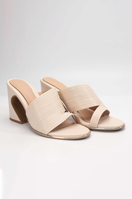 Shop Heel Your Sole Beige Plain Kiko Striped Strap Block Heels at Aza Fashions Shop_Heel Your Sole_Beige Plain Kiko Striped Strap Block Heels _at_Aza_Fashions