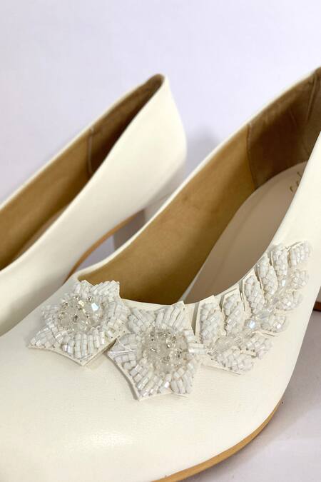 Ciel_White Cut Work, Pearls Florence 3-d Floral Embellished Stilettoes _Online_at_Aza_Fashions