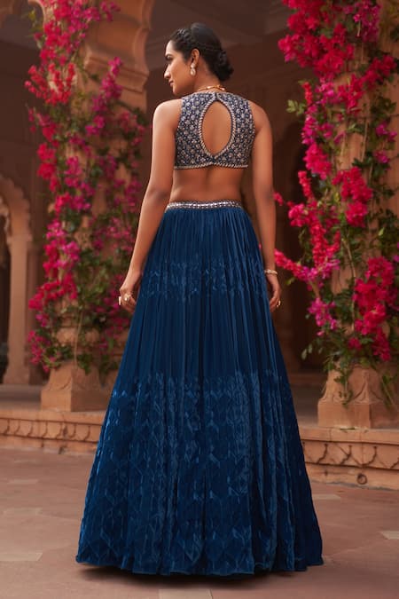 Shop Reeti Arneja Blue Silk, Velvet, Organza Cut Geometric Pleated Lehenga Tribal Hand Blouse Set at Aza Fashions Shop_Reeti Arneja_Blue Silk, Velvet, Organza Cut Geometric Pleated Lehenga Tribal Hand Blouse Set _at_Aza_Fashions