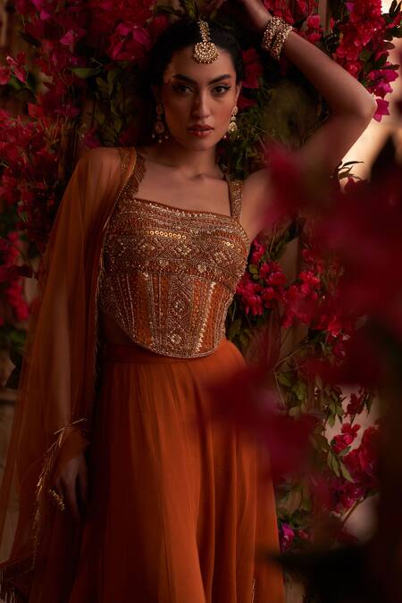 Buy_Reeti Arneja_Orange Net, Georgette Sequins, Beads, Embroidery Floral Corset Sharara Set _Online_at_Aza_Fashions