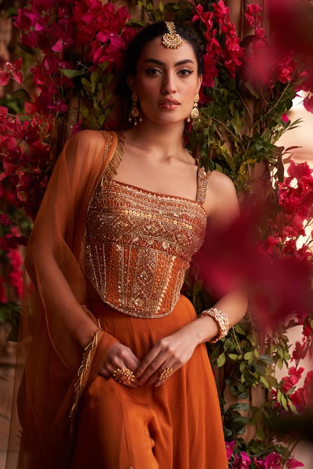 Shop_Reeti Arneja_Orange Net, Georgette Sequins, Beads, Embroidery Floral Corset Sharara Set _Online_at_Aza_Fashions