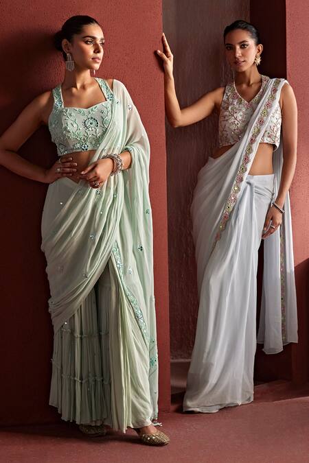 Tarini Vij Blue Georgette Ruhie Scalloped Border Pre-draped Saree With Mirrorwork Blouse at Aza Fashions Tarini Vij_Blue Georgette Ruhie Scalloped Border Pre-draped Saree With Mirrorwork Blouse _at_Aza_Fashions