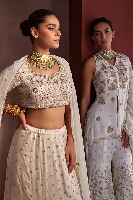 Tarini Vij_White Georgette Pearls, Faiza Floral Blossom Dabka Peplum Kurta Sharara Set _at_Aza_Fashions
