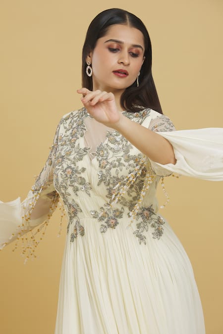 Mani Bhatia White Tassels Round Neck Floral Embroidered Draped Anarkali at Aza Fashions Mani Bhatia_White Tassels Round Neck Floral Embroidered Draped Anarkali_at_Aza_Fashions
