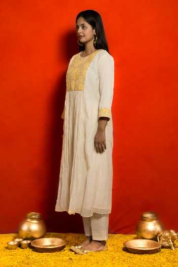 Mithi Supari Ivory Malai Chanderi Embroidered Floral Applique Gathered Work Kurta And Pant Set Online at Aza Fashions Mithi Supari_Ivory Malai Chanderi Embroidered Floral Applique Gathered Work Kurta And Pant Set _Online_at_Aza_Fashions