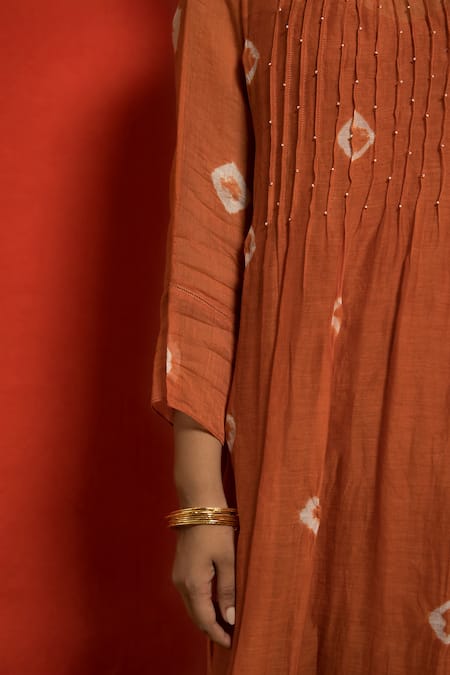 Shop_Mithi Supari_Orange Chanderi, Cotton Beads Round Neck Pintucked Yoke Tunic And Pant Set _Online_at_Aza_Fashions