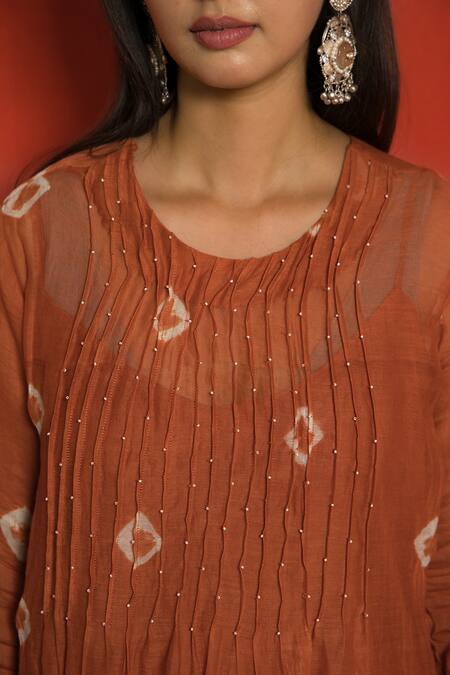 Mithi Supari_Orange Chanderi, Cotton Beads Round Neck Pintucked Yoke Tunic And Pant Set _at_Aza_Fashions