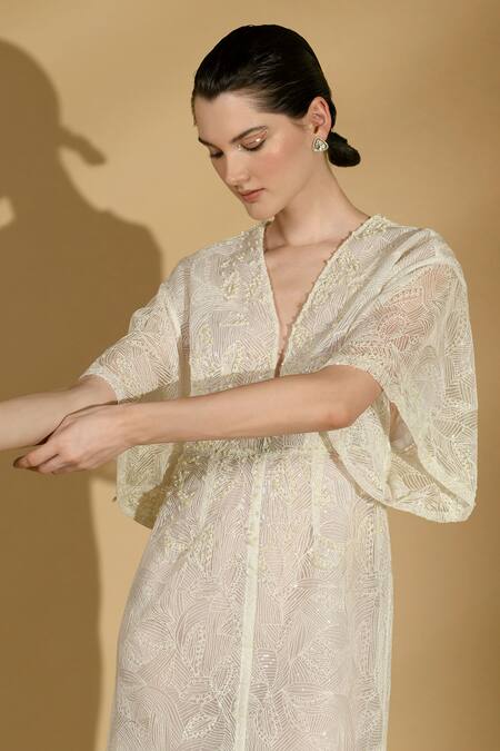 Geisha Designs White Nylon Embroidered Sequins Plunged V Victoria Pearl Kaftan Gown Online at Aza Fashions Geisha Designs_White Nylon Embroidered Sequins Plunged V Victoria Pearl Kaftan Gown _Online_at_Aza_Fashions