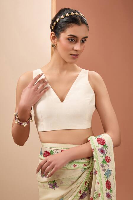 Shop_Neha Khullar_Ivory Silk, Cotton, Viscose Tassels V-neck Floral Bloom Print Saree With Blouse _Online_at_Aza_Fashions
