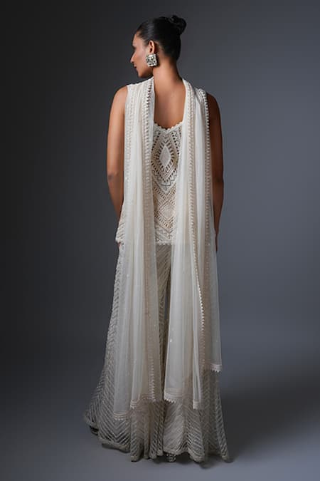 Shop Ritika Mirchandani Ivory Net, Crepe, Georgette, Denim Crystals, Iman Chevron Kurta Sharara Set at Aza Fashions Shop_Ritika Mirchandani_Ivory Net, Crepe, Georgette, Denim Crystals, Iman Chevron Kurta Sharara Set _at_Aza_Fashions