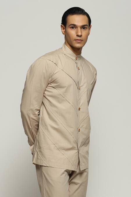 Abraham And Thakore Beige Poplin Digonal Pleated Button Down Shirt at Aza Fashions Abraham And Thakore_Beige Poplin Digonal Pleated Button Down Shirt_at_Aza_Fashions