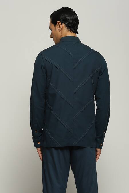 Shop Abraham And Thakore Blue Poplin Diagonal Pleats Sleeveless Bundi at Aza Fashions Shop_Abraham And Thakore_Blue Poplin Diagonal Pleats Sleeveless Bundi_at_Aza_Fashions