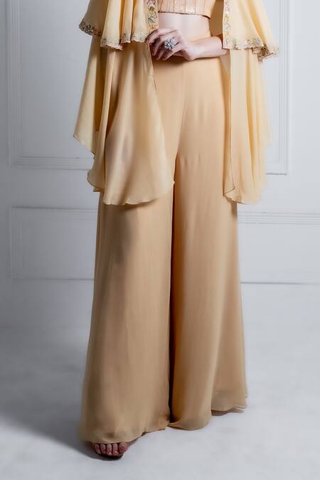 Radhika & Raghav_Gold Georgette Embroidery Thread Cape Open Mia Border Sharara Set _at_Aza_Fashions