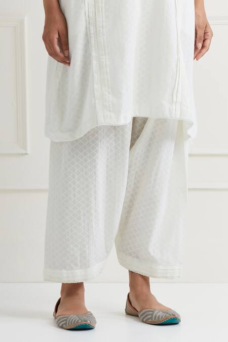 Buy Nemaani Off White Cotton Embroidery, Lace V-neck Kurta And Salwar Set Online at Aza Fashions Buy_Nemaani_Off White Cotton Embroidery, Lace V-neck Kurta And Salwar Set _Online_at_Aza_Fashions