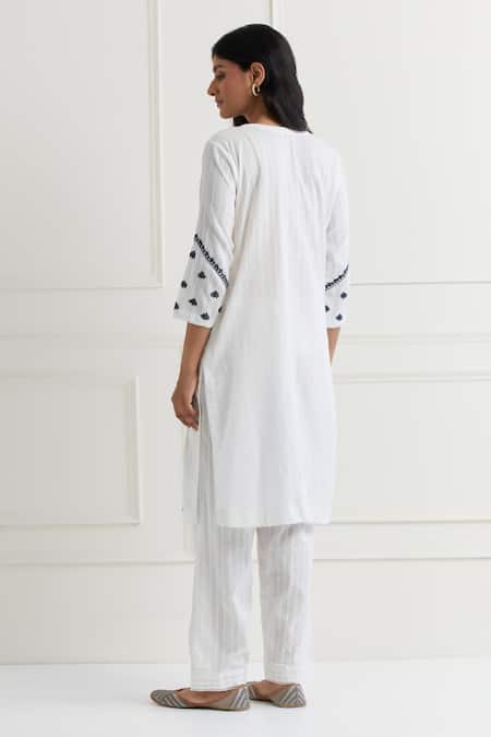 Shop Nemaani Off White Cotton Embroidery Round Neck Floral Thread Kurta Pant Set at Aza Fashions Shop_Nemaani_Off White Cotton Embroidery Round Neck Floral Thread Kurta Pant Set _at_Aza_Fashions