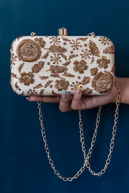 Shop The Tan Clan Beige Zari Aabish Floral Zardozi Embroidered Clutch at Aza Fashions Shop_The Tan Clan_Beige Zari Aabish Floral Zardozi Embroidered Clutch _at_Aza_Fashions