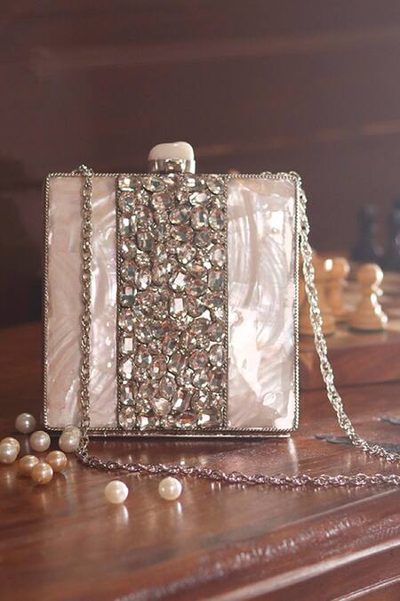 The Tan Clan Silver Mother Of Pearls Liyana Embellished Clutch Online at Aza Fashions The Tan Clan_Silver Mother Of Pearls Liyana Embellished Clutch _Online_at_Aza_Fashions