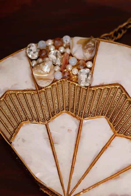 Buy_The Tan Clan_Gold Crystals, Stones, Pearls Pankh Mother Of Embellished Clutch _Online_at_Aza_Fashions
