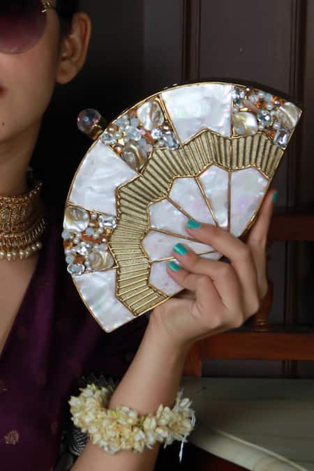 Shop_The Tan Clan_Gold Crystals, Stones, Pearls Pankh Mother Of Embellished Clutch _Online_at_Aza_Fashions