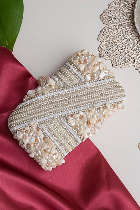 Shop The Tan Clan White Pearls, Zari Saliha Sea Shells Embroidered Clutch at Aza Fashions Shop_The Tan Clan_White Pearls, Zari Saliha Sea Shells Embroidered Clutch _at_Aza_Fashions