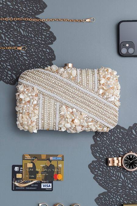 The Tan Clan White Pearls, Zari Saliha Sea Shells Embroidered Clutch Online at Aza Fashions The Tan Clan_White Pearls, Zari Saliha Sea Shells Embroidered Clutch _Online_at_Aza_Fashions