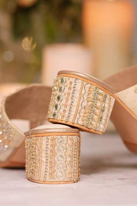 House Of Vian Gold Cut Work, Mirrors, Stones, Beads Zoya Tasseled Kolhapuri Block Heels Online at Aza Fashions House Of Vian_Gold Cut Work, Mirrors, Stones, Beads Zoya Tasseled Kolhapuri Block Heels _Online_at_Aza_Fashions