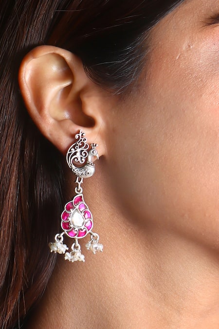 Noor Pink Kundan Embellished Peacock Carved Dangler Earrings