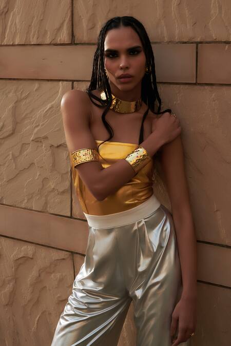 Cin Cin_Gold Leatherette Off-shoulder Metallic Off Jumpsuit_at_Aza_Fashions