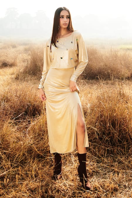 Shop Cin Cin Gold Lycra Crystals Boat Neck Embroidered Top And Skirt Set at Aza Fashions Shop_Cin Cin_Gold Lycra Crystals Boat Neck Embroidered Top And Skirt Set _at_Aza_Fashions