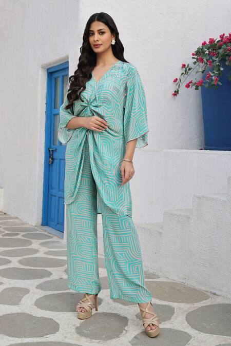 Buy Seams Pret And Couture Blue Crepe, Cotton Sequins V-neck Vania Geometric Print Long Top With Pant Online at Aza Fashions Buy_Seams Pret And Couture_Blue Crepe, Cotton Sequins V-neck Vania Geometric Print Long Top With Pant _Online_at_Aza_Fashions