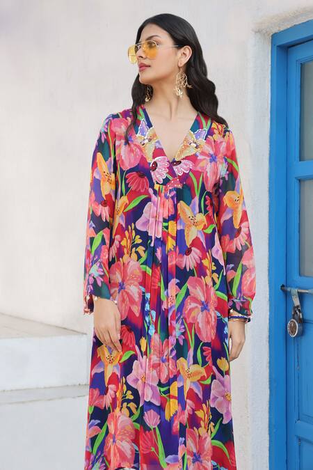 Buy Seams Pret And Couture Blue Georgette Pearls, Sequins V-neck Calendonia Floral Print Pleated Dress Online at Aza Fashions Buy_Seams Pret And Couture_Blue Georgette Pearls, Sequins V-neck Calendonia Floral Print Pleated Dress _Online_at_Aza_Fashions