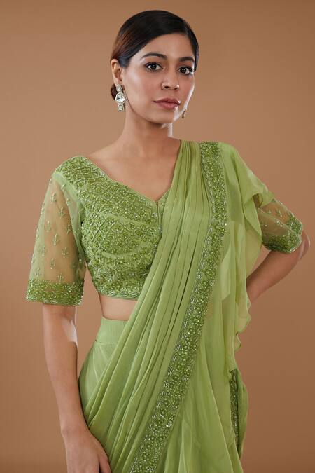 Buy Baidehi Green Organza, Net, Crepe Draped Layered Ruffle Lehenga Saree With Blouse Online at Aza Fashions Buy_Baidehi_Green Organza, Net, Crepe Draped Layered Ruffle Lehenga Saree With Blouse _Online_at_Aza_Fashions