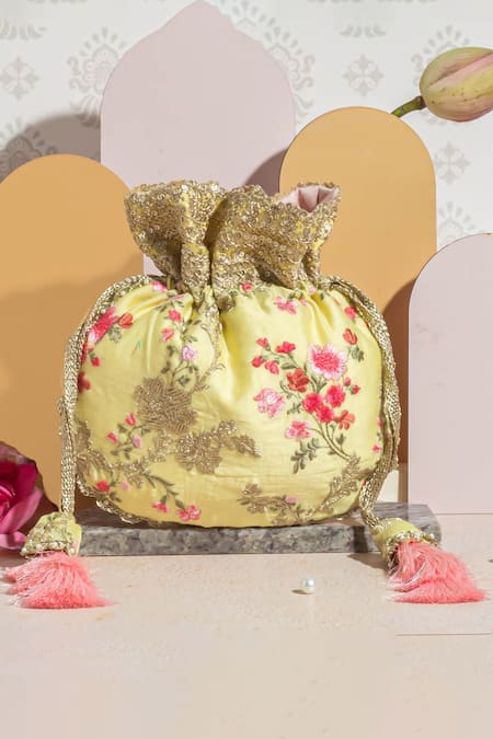 Shop Amyra Yellow Embroidery, Tassels Reet Silk Thread Potli at Aza Fashions Shop_Amyra_Yellow Embroidery, Tassels Reet Silk Thread Potli_at_Aza_Fashions