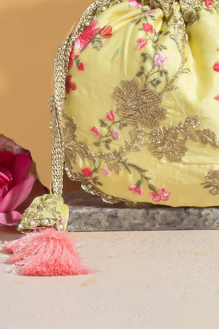 Amyra Yellow Embroidery, Tassels Reet Silk Thread Potli Online at Aza Fashions Amyra_Yellow Embroidery, Tassels Reet Silk Thread Potli_Online_at_Aza_Fashions
