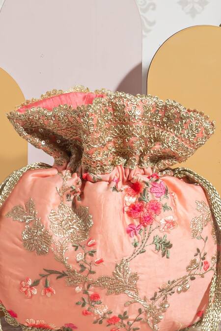 Amyra_Peach Embroidery, Tassels Reet Silk Zari Thread Potli_Online_at_Aza_Fashions