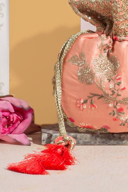 Buy_Amyra_Peach Embroidery, Tassels Reet Silk Zari Thread Potli_Online_at_Aza_Fashions