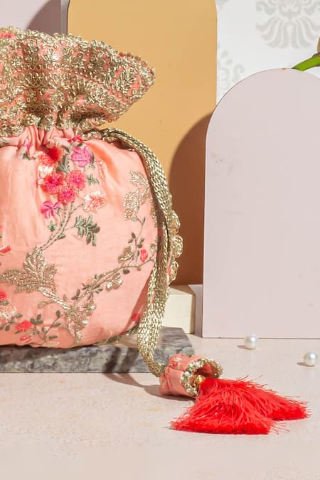 Shop_Amyra_Peach Embroidery, Tassels Reet Silk Zari Thread Potli_Online_at_Aza_Fashions