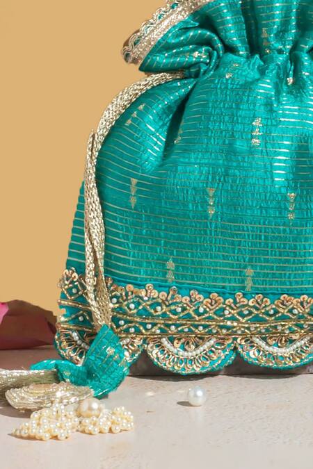 Amyra_Blue Pearls, Zari, Lace Tari Silk Embroidered Potli Bag_Online_at_Aza_Fashions