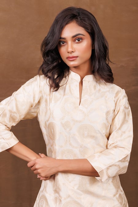 Shop Vishwa By Pinki Sinha Ivory Silk Mandarin Collar Floral Handwoven Kurta And Dhoti Pant Set Online at Aza Fashions Shop_Vishwa By Pinki Sinha_Ivory Silk Mandarin Collar Floral Handwoven Kurta And Dhoti Pant Set _Online_at_Aza_Fashions