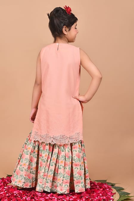 Shop THE COTTON STAPLE Peach Cotton Lace, Embroidery, Tassels Birch Cutwork Kurta Sharara Set at Aza Fashions Shop_THE COTTON STAPLE_Peach Cotton Lace, Embroidery, Tassels Birch Cutwork Kurta Sharara Set _at_Aza_Fashions
