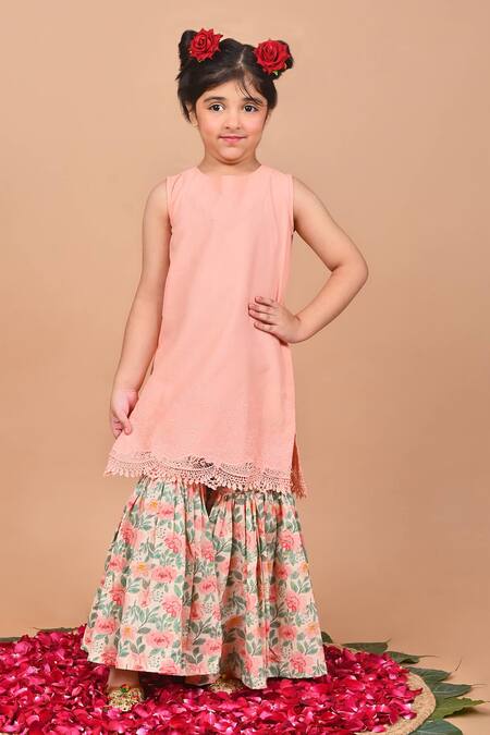 Shop THE COTTON STAPLE Peach Cotton Lace, Embroidery, Tassels Birch Cutwork Kurta Sharara Set Online at Aza Fashions Shop_THE COTTON STAPLE_Peach Cotton Lace, Embroidery, Tassels Birch Cutwork Kurta Sharara Set _Online_at_Aza_Fashions