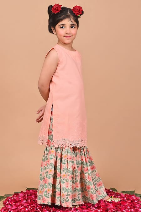 THE COTTON STAPLE Peach Cotton Lace, Embroidery, Tassels Birch Cutwork Kurta Sharara Set at Aza Fashions THE COTTON STAPLE_Peach Cotton Lace, Embroidery, Tassels Birch Cutwork Kurta Sharara Set _at_Aza_Fashions
