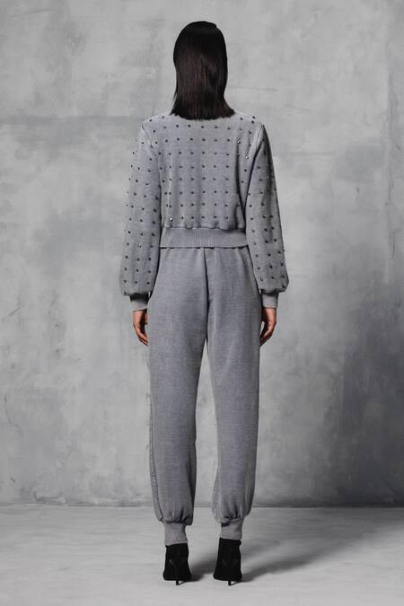 Shop Mellowdrama Grey Cotton Studs Round Neck Embellished Sweatshirt at Aza Fashions Shop_Mellowdrama_Grey Cotton Studs Round Neck Embellished Sweatshirt_at_Aza_Fashions