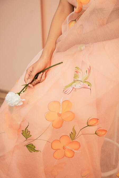 Shop Mangalmay By Aastha Peach Saree Pure Organza Hand Painted Flower With Unstitched Blouse Piece Online at Aza Fashions Shop_Mangalmay By Aastha_Peach Saree Pure Organza Hand Painted Flower With Unstitched Blouse Piece _Online_at_Aza_Fashions