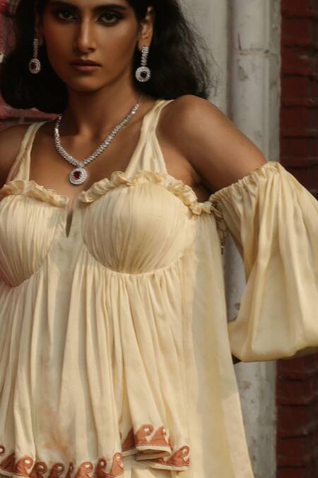 Ekastories_Ivory Modal Sweetheart Neck Ruffle Detailing Bralette And Pant Set_Online_at_Aza_Fashions