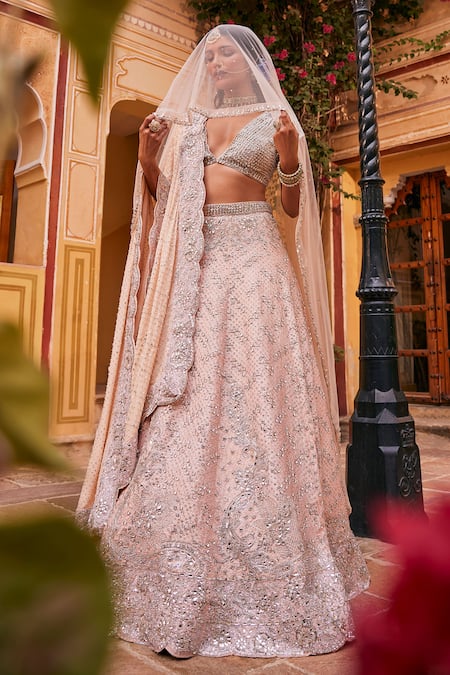 Shop The Royaleum Peach Silk, Net, Crepe Stones, Aashma And Embellished Bridal Lehenga Set at Aza Fashions Shop_The Royaleum_Peach Silk, Net, Crepe Stones, Aashma And Embellished Bridal Lehenga Set _at_Aza_Fashions