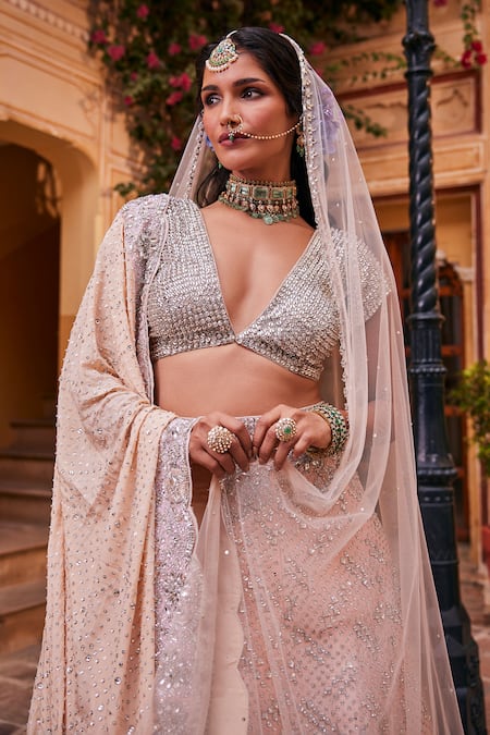 The Royaleum Peach Silk, Net, Crepe Stones, Aashma And Embellished Bridal Lehenga Set Online at Aza Fashions The Royaleum_Peach Silk, Net, Crepe Stones, Aashma And Embellished Bridal Lehenga Set _Online_at_Aza_Fashions