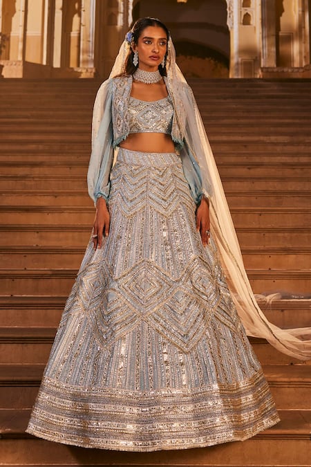 Buy The Royaleum Blue Silk, Net Crystals, Stones, Sequins, Tassels Round Embroidered Lehenga Set Online at Aza Fashions Buy_The Royaleum_Blue Silk, Net Crystals, Stones, Sequins, Tassels Round Embroidered Lehenga Set _Online_at_Aza_Fashions
