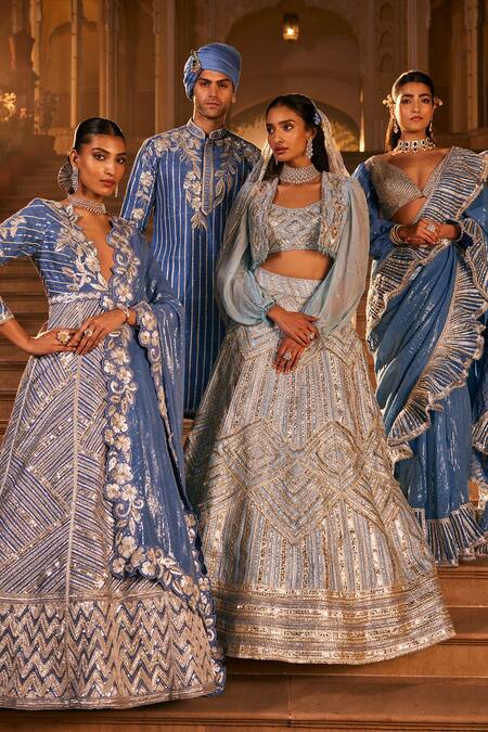 The Royaleum Blue Silk Sequins, Gota Patti V-neck Embroidered Frilled Border Saree Set Online at Aza Fashions The Royaleum_Blue Silk Sequins, Gota Patti V-neck Embroidered Frilled Border Saree Set _Online_at_Aza_Fashions