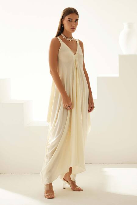Buy Wear Jaja Cream Modal V-neck Solid V Asymmetrical Maxi Dress Online at Aza Fashions Buy_Wear Jaja_Cream Modal V-neck Solid V Asymmetrical Maxi Dress_Online_at_Aza_Fashions